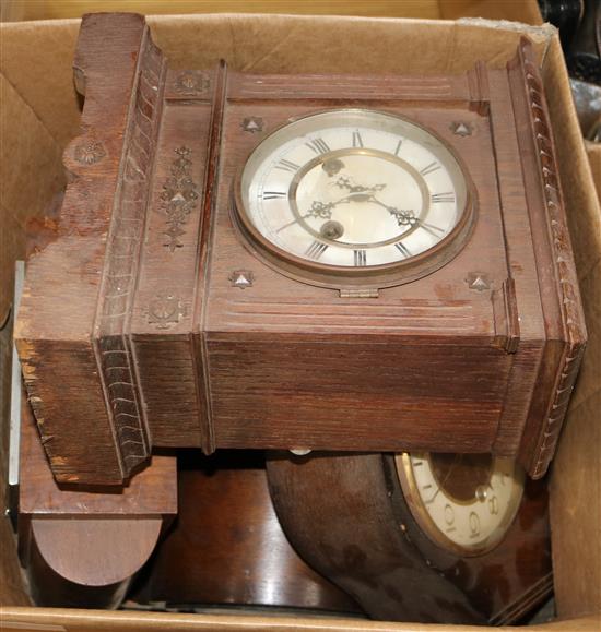 A box of assorted mantel clocks